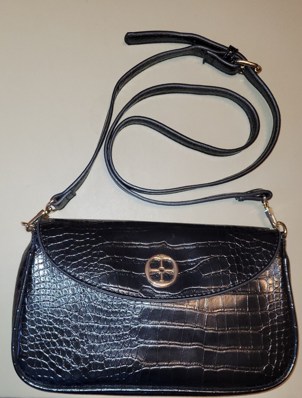 IMAN Black Croc-Embossed Shoulder Bag with Gold Accents.